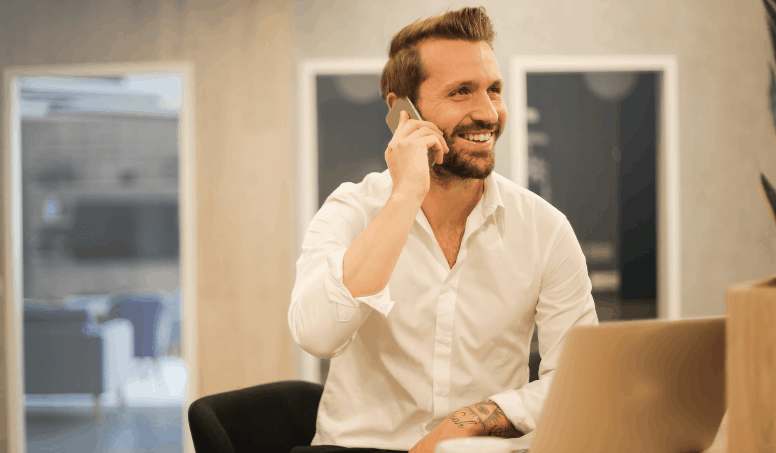 A Business Man Talking To Customer